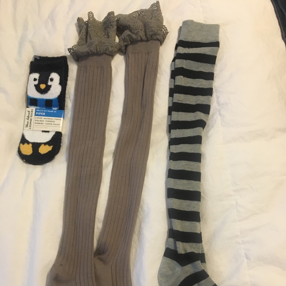 One pair of fuzzy socks and two pair of stockings.
